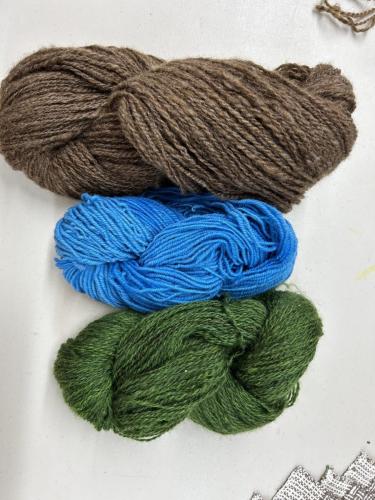 Heather's handspun. Brown Corriedale. Blue Shropshire. Green Coopworth