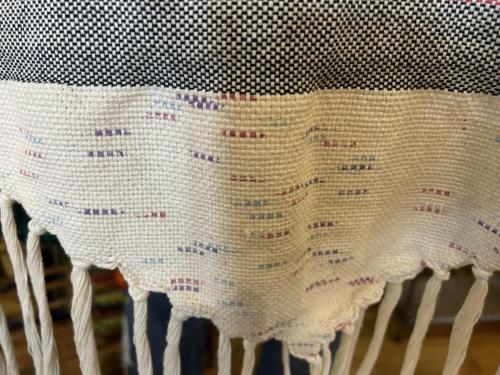 detail of Dennis' wallhanging with shaped hem