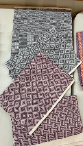 Guild-placemats-in-navy-and-maroon
